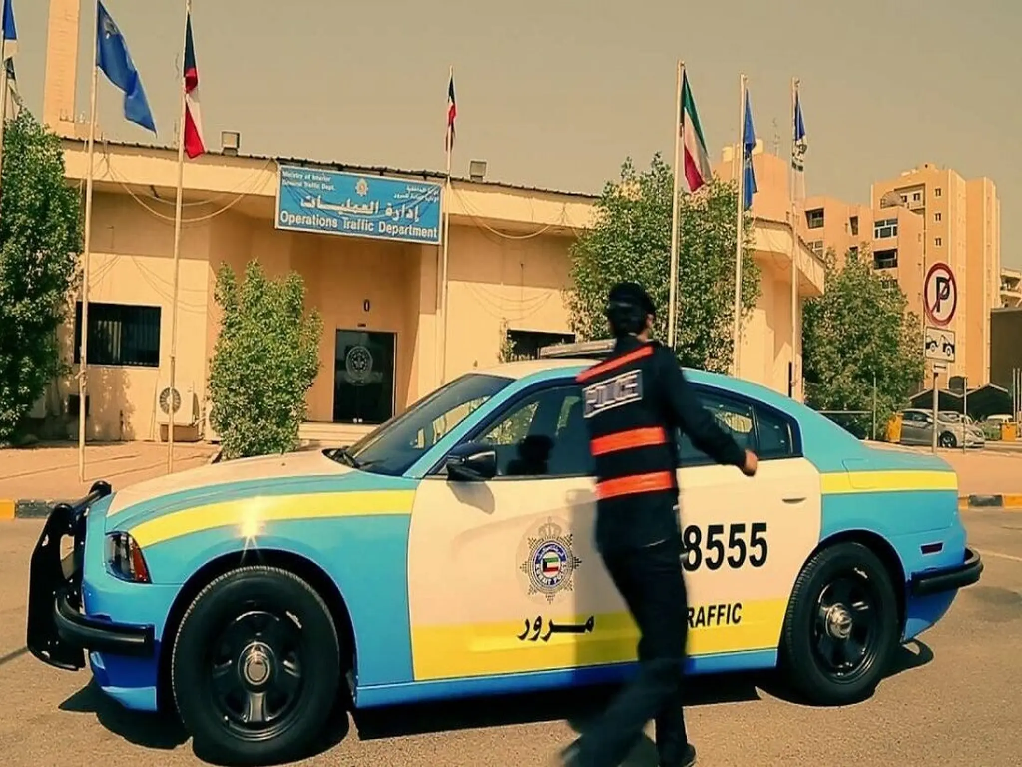 A man and a woman slapped a policeman in Kuwait, beat him, and blocked traffic