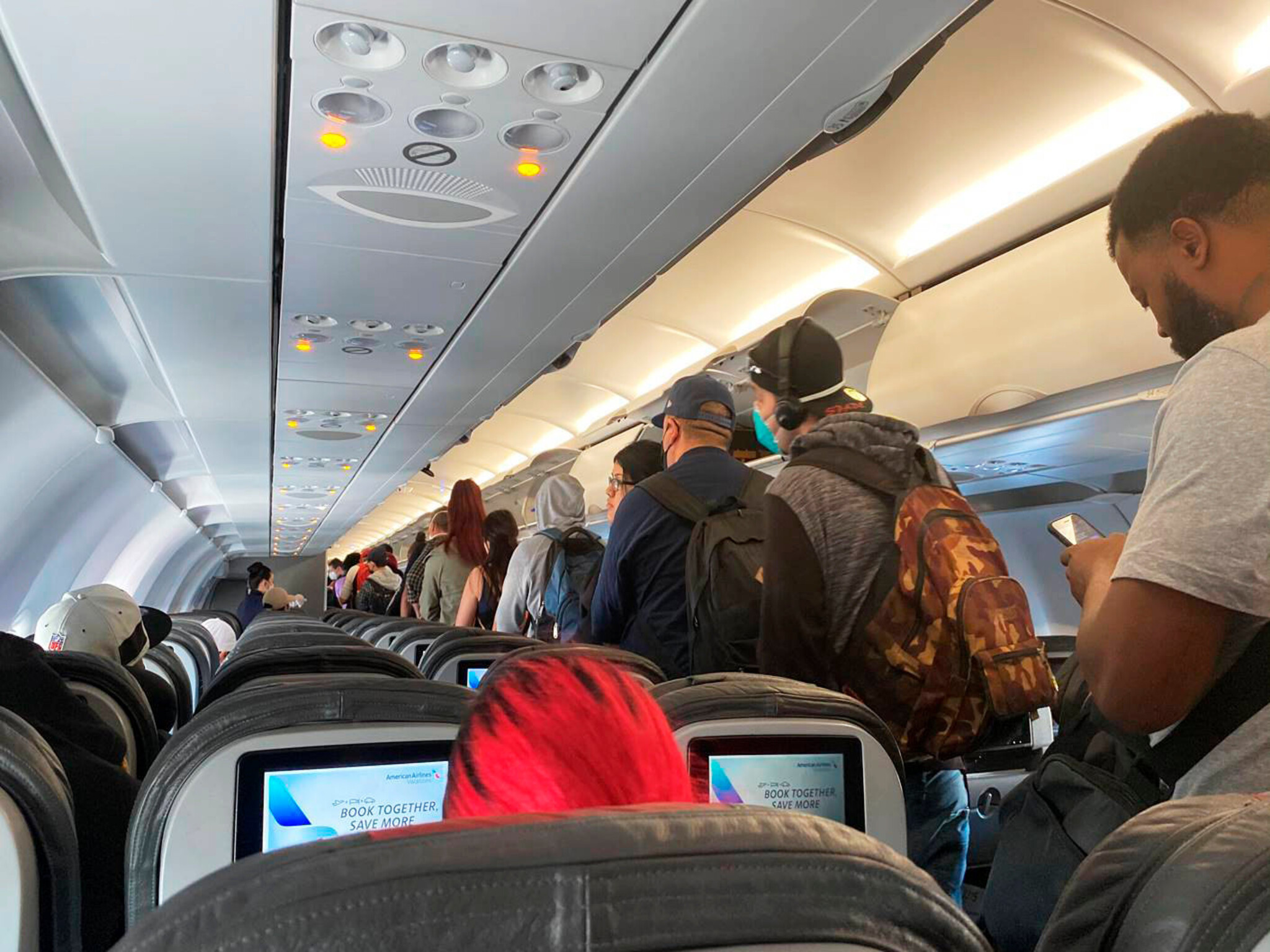 Travelers describe how passengers on the plane lose valuable items