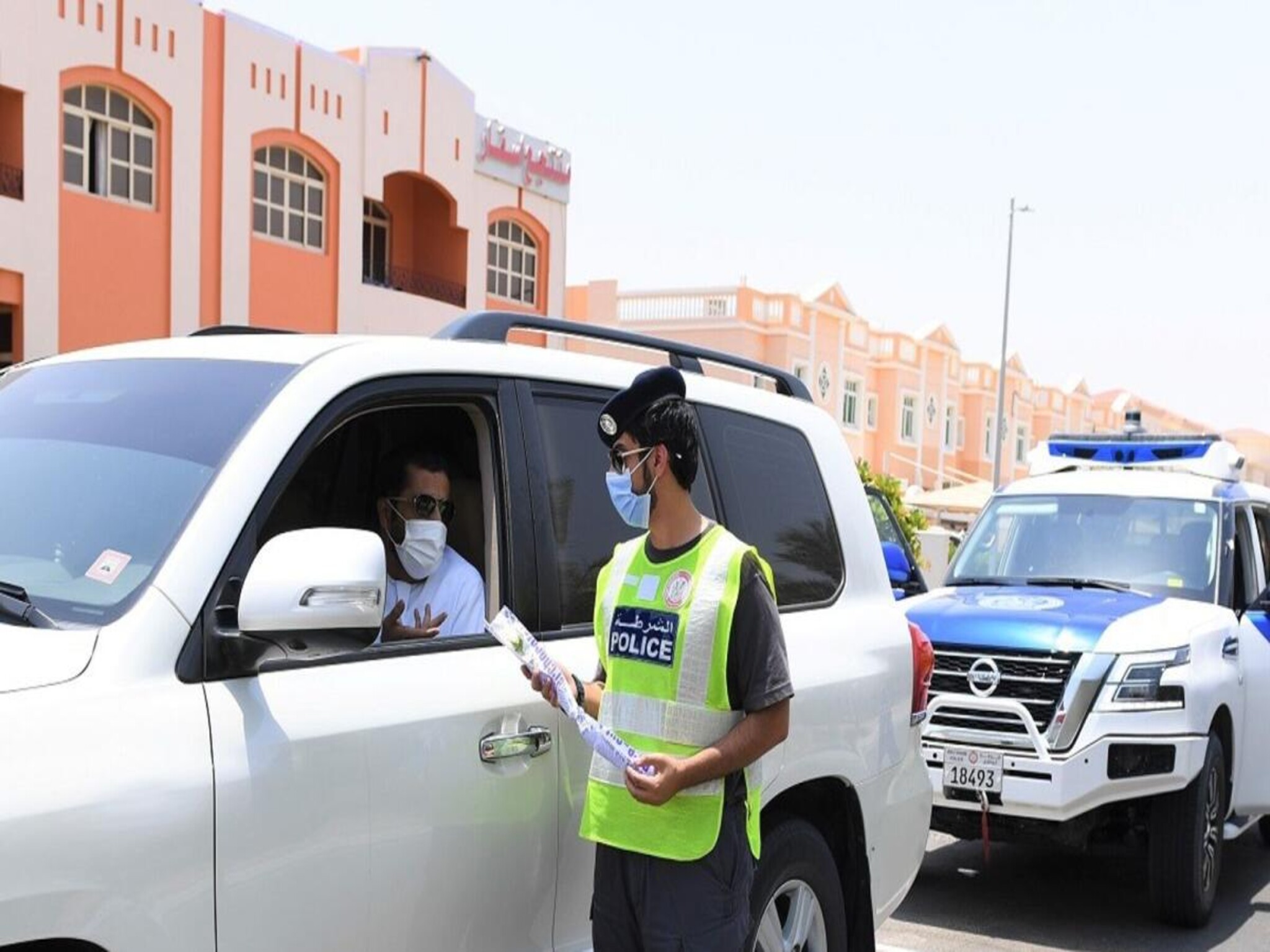 The police distribute free fuel cards to drivers in Abu Dhabi